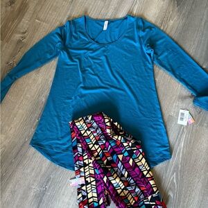 Lularoe outfit lynnae med solid blue is  geometric. Leggings. New with tag.